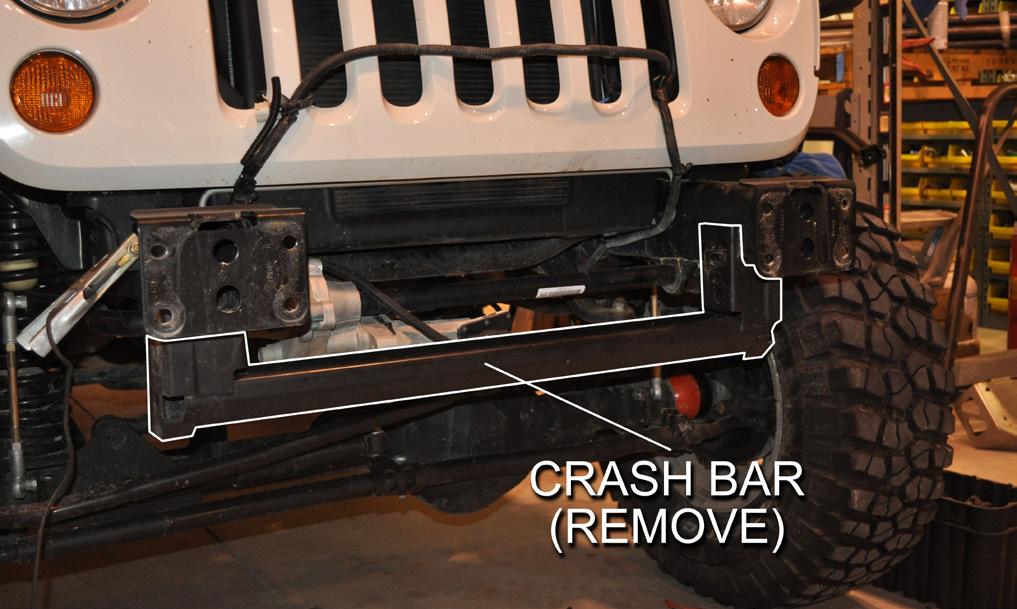 At each end of the Crash Bar there is a vertical bracket that attaches it to each frame rail. Cut these brackets off as close as possible where they meet the frame rail.
