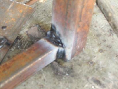 5cm long piece of square pipe to a corner of the U-shape as seen in the