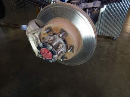 debris from the rotor that may exist around the wheel mounting