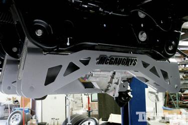 As for the rear control arm bracing, the fully boxed replacement was larger and