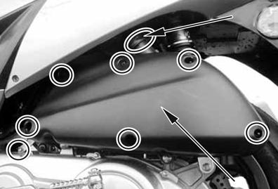 As the fluid is draining from the transmission, slowly rotate the rear wheel to force all of the fluid from the transmission. 4.
