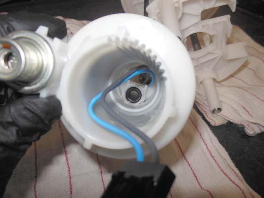 Apply a light coat of Lubriplate grease on the supplied fuel pump discharge O-ring, and insert