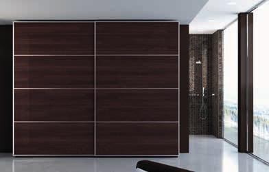 95 Adjustable sliding system of wardrobe doors with veneered panels, equipped with dampered air stops or