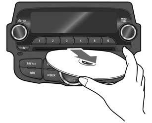 7-28 Infotainment System Eject disc Changing playing track To end play, press the EJECT [Z ] button button to take out the disc.