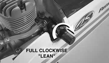 Cover the carburetor opening with your finger, grab the propeller and turn it counterclockwise several times until you can see fuel flowing into the carburetor through the carburetor line.