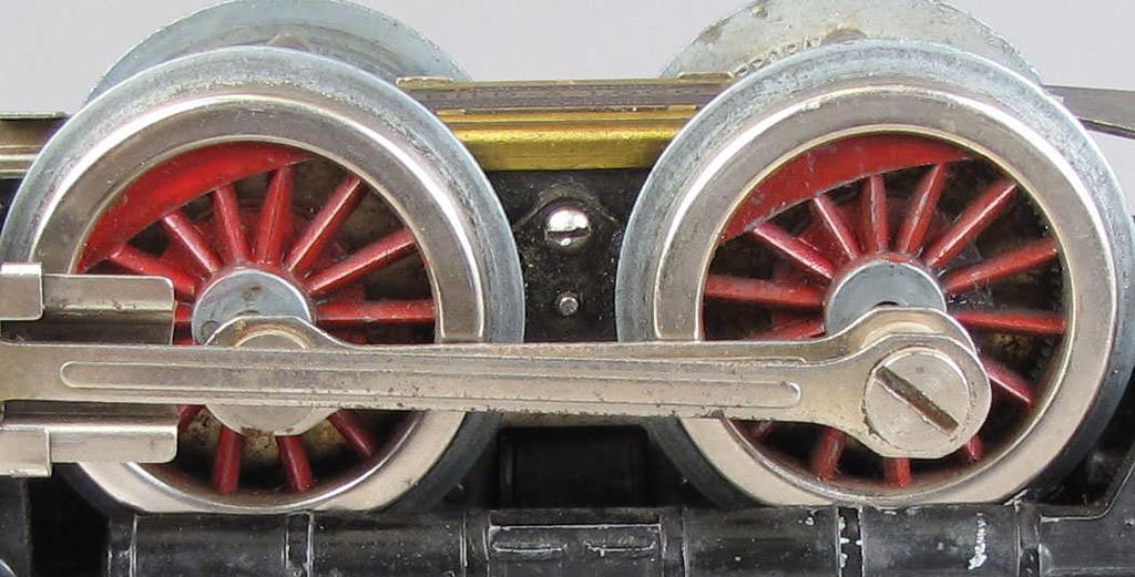 right side, dark gear cover, two studs with indented area, nickel finished pickup assembly with Type 4 identification plate: Standard Locomotive.