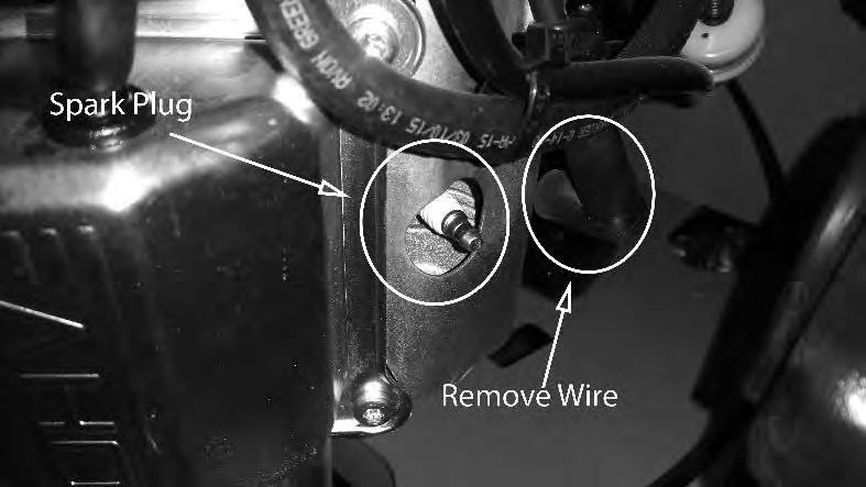 1) Remove the wire on the spark plug and use a 5/8 socket to remove the spark plug.