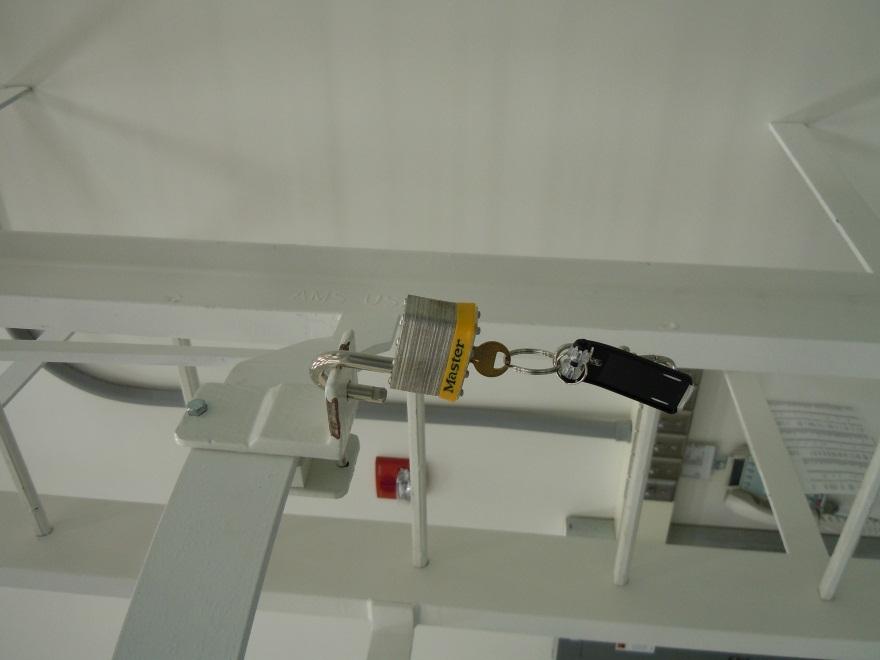 using the remote Unlock cage ladder access leaving the key in the lock as