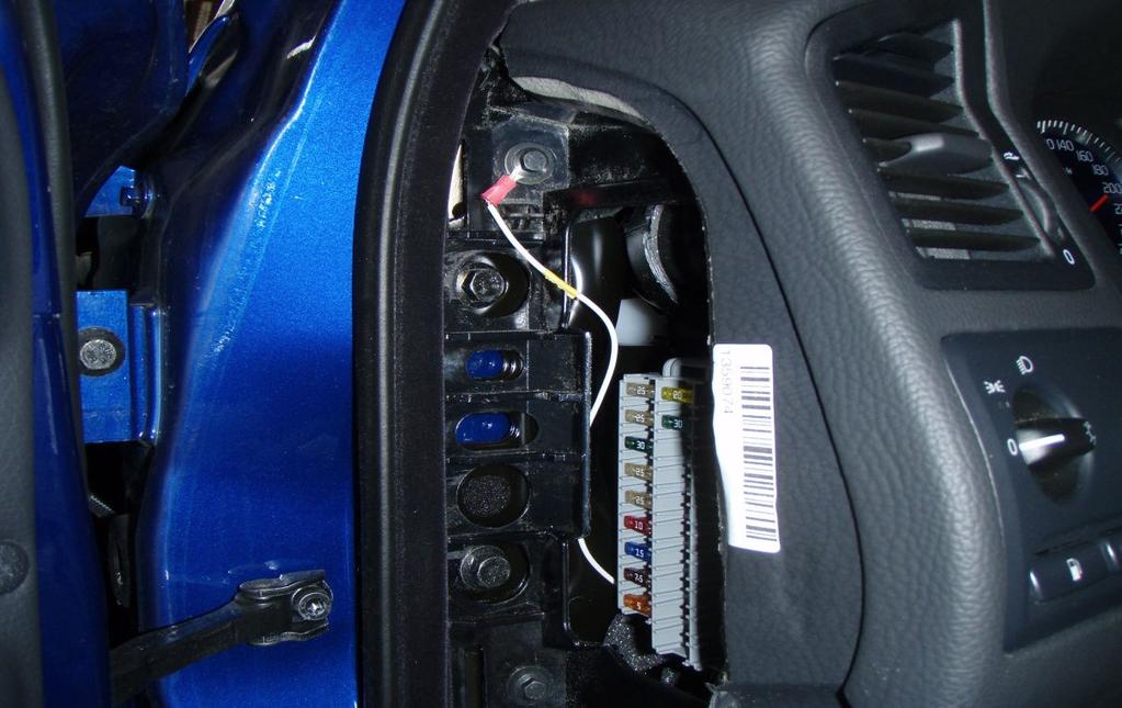 It supplies switched power to both the front and rear 12V aux outlets.