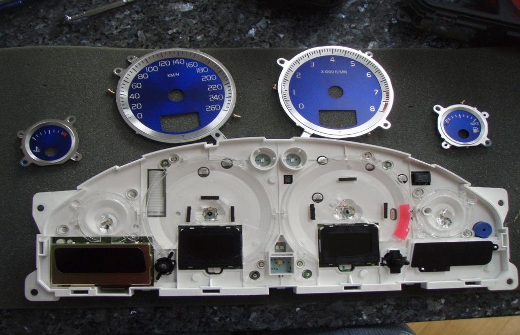 Remove the screws from each of the dials and set everything aside.