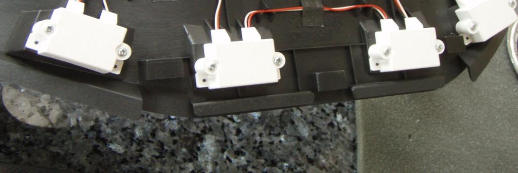 Snip off the small white connector and strip the ends of the two wires.