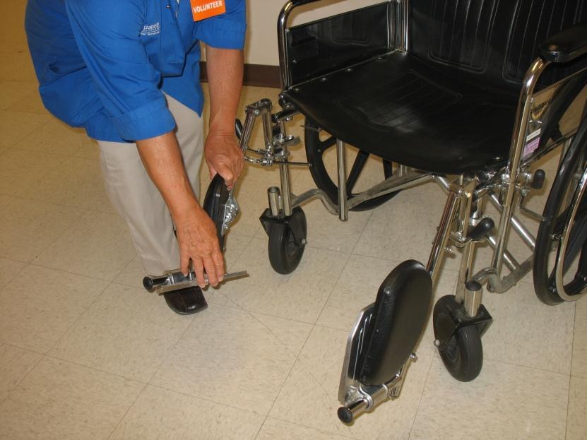 Steps for Providing Wheelchair Transport 2. Raise footrests and pads so the guest may easily get into the wheelchair. 3.