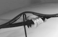 Notice: Allowing the wiper blade arm to touch the windshield when no wiper blade is installed could damage the windshield. Any damage that occurs would not be covered by your warranty.