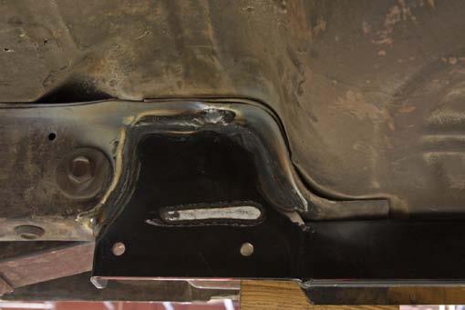 25. The rear bracket is welded along the top corner of