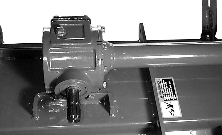 Remove eight cap screws (C) holding output jackshaft into gear case. 23 Tooth Bevel Gear Drain Plug Bearing Bearing Gasket B Seal Shaft Nut Ring M94963 10.