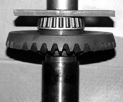 Support the lower bearing (S) on the shoulder of the bearing and press it off of the shaft. R S GEAR BOX ASSEMBLY Procedure: 1.