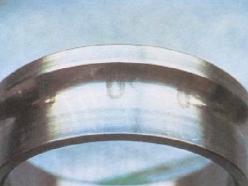 () Fretting Occurred when a small relative motion is repeatedly caused in non rotating bearing. Fretting surface wear producing red colored particles at fitting surface.