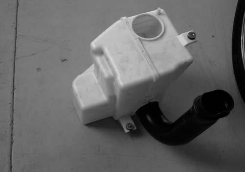 2) Removal of the Stock Air Intake System and Modification of Components a) Remove the strut bar from the shock towers