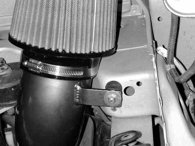 in the picture. b) Insert the 2.5 x 3.0 coupler on to the throttle body (this is a tight fit).