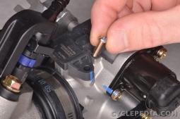 Install the T-MAP into the throttle body, being