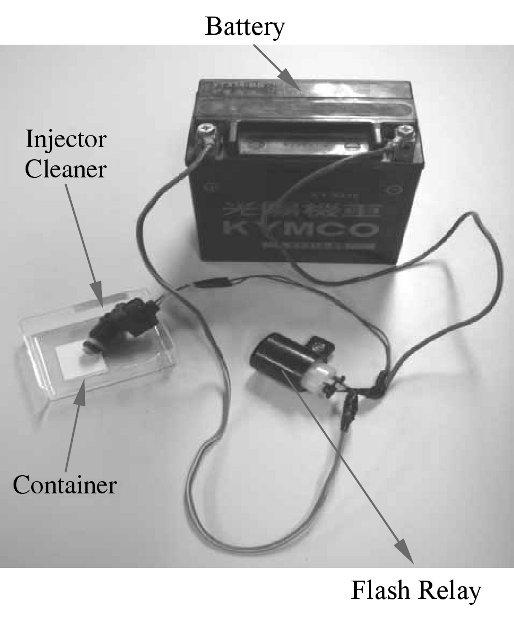 SOLUTION 1. Use the specified injector cleaner. 2. Connect the battery as pictured. 3.