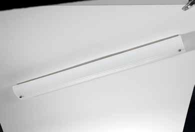 LINEAR / TROFFER Domes CONTOURED WHITE ACRYLIC DOMES WITH CURVED, TEXTURED WHITE MOLDING.