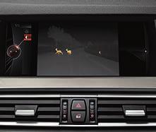 The infrared images are shown in the Control Display and the driver is alerted to potential hazards using a visual and acoustic warning.