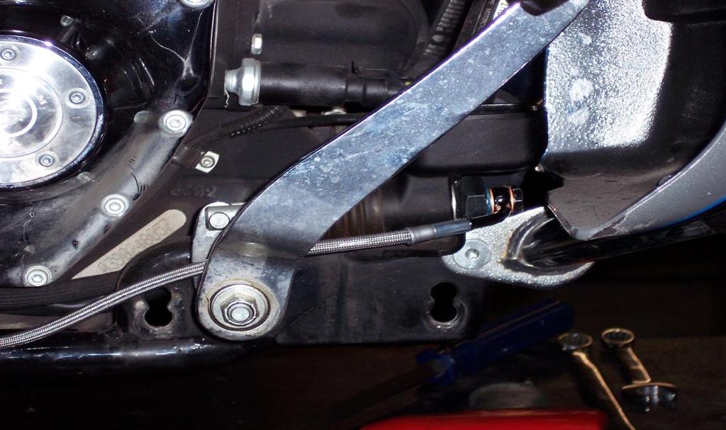 Brake Line Installation: NOTE: if ABS equipped refer to separate instructions. 1. Remove the two wire clips from the rear stop lamp switch. 2. Remove the Banjo Bolt from the Rear Master Cylinder. 3.