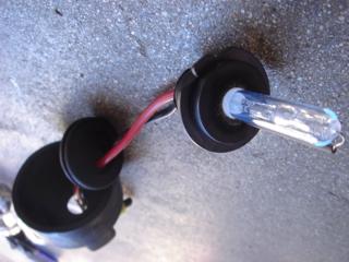 Feed the HID bulb wirethrough the Pegasus rear rubber boot