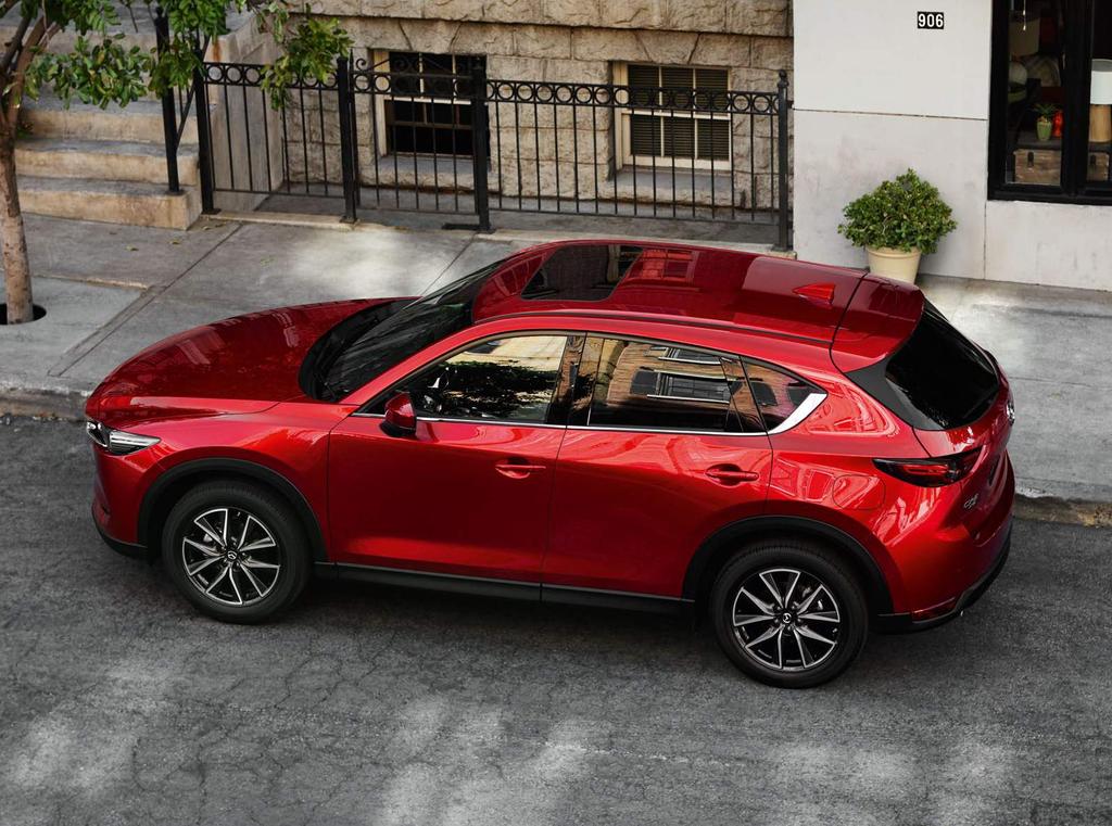 AWAKEN THE DRIVER IN YOU When you drive a Mazda you never drive alone.