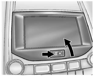 In a crash, these objects may cause the cover to open and could result in injury. Instrument Panel Storage Uplevel The vehicle may have a storage area behind the radio display.