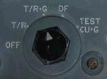 Returning to the rear of the left console, rotate the VHF radio mode selector to the T/R+G position to switch on the