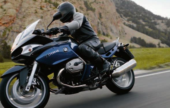 The sheer power of the BMW R 1200 ST propels you forward, even