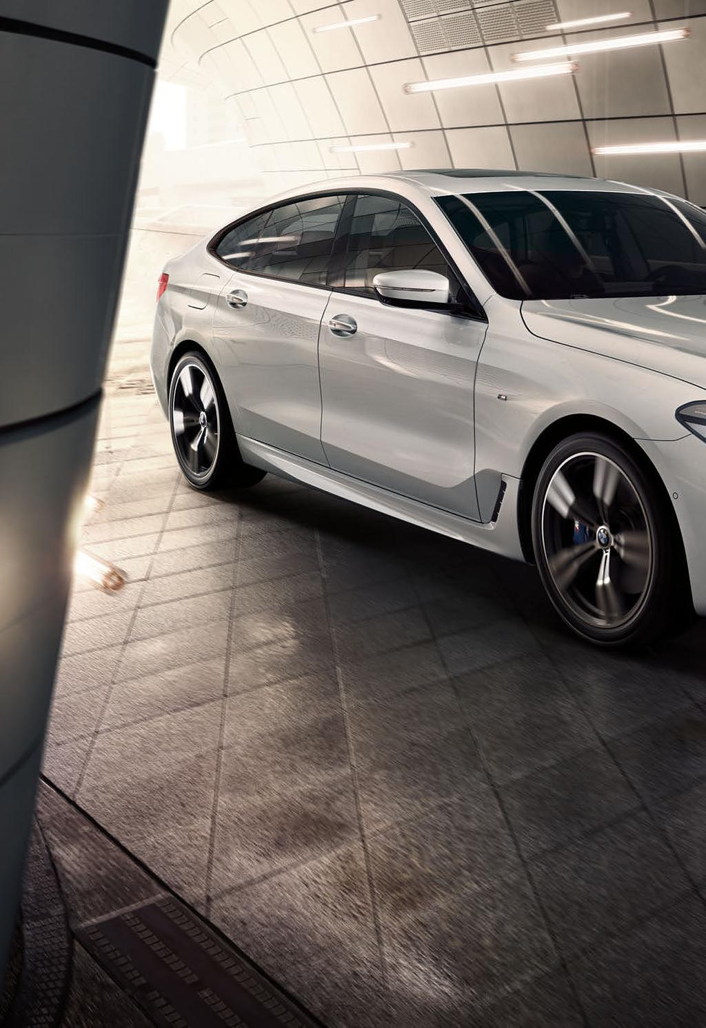 THE NEW BMW 6 SERIES GRAN TURISMO HAS EARNT ITS NAME IT COMBINES AN EXCEPTIONALLY SPACIOUS INTERIOR WITH MAXIMUM