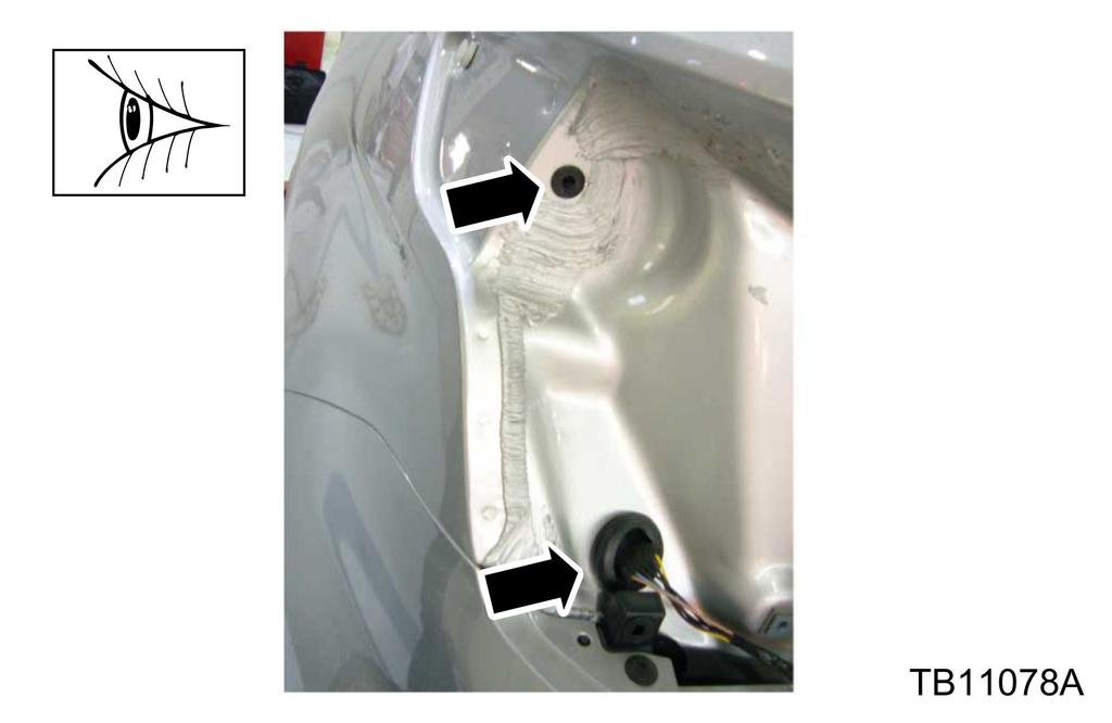 Verify all rear lamp mounting and wiring harness grommets are sitting flush against the body. a. Inspect for excess body sealer beneath the grommet preventing it from fully seating thereby creating a leak.
