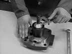 NOTE: To simplify bearing removal, it is recommended that the cover and/or pump housing be locked in a