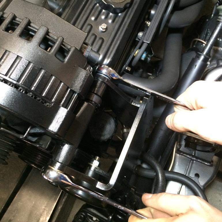 The M12 nut can be installed and the upper bolt tightened at this time.