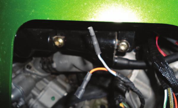 quick connector with the red/white wire from the PCV harness to the upper coil terminal stock connector as shown in Figure I.