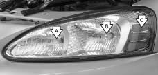 Headlamps and Sidemarker Lamps 1. Open the hood.