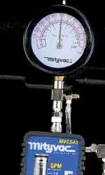 Once fuel fills the flowmeter and flows through the bypass hose, return the valve to the OPEN position.