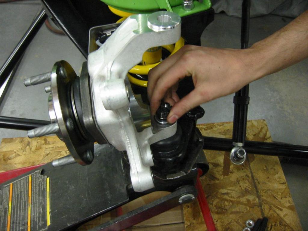 4. Install the AFX spindle onto the lower ball joint.