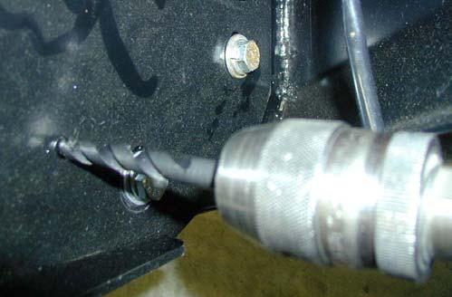 Then tighten up the long M tension bolts, ensuring that the clevis nut location slot is positioned correctly over the hole edge in the chassis, protrusion as shown is approximately 7mm. 78.