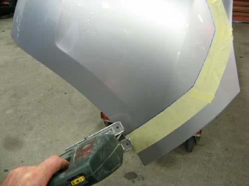 Remove burrs from the cut edge of the bumper, then set aside on the soft non abrasive surface.