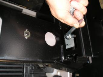 Insert M12 Tagged bolt / flat washer into the chassis rail and pass