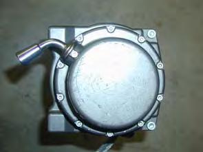 Then rotate the end cap and gearbox in a counter clockwise direction 144 ( four hole pitches) while looking down at the