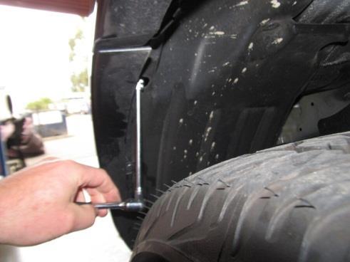 6. Remove wheel arch bolts.