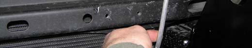 CAUTION: When fitting the Chassis mounting bracket carefully bend the air-conditioning pipe out