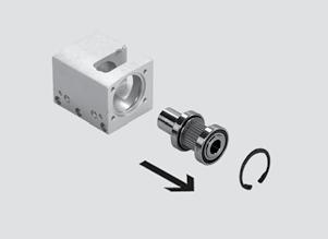 3. Remove the toothed belt pulley module with the two deep-groove ball bearings from the drive cover.