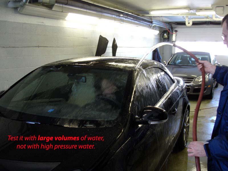 Flood the car with water, hit all the seals directly, but don't use a nozzle on the end of