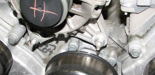 43. Use a 13mm socket to remove the two nuts at the bottom of the alternator. 46.